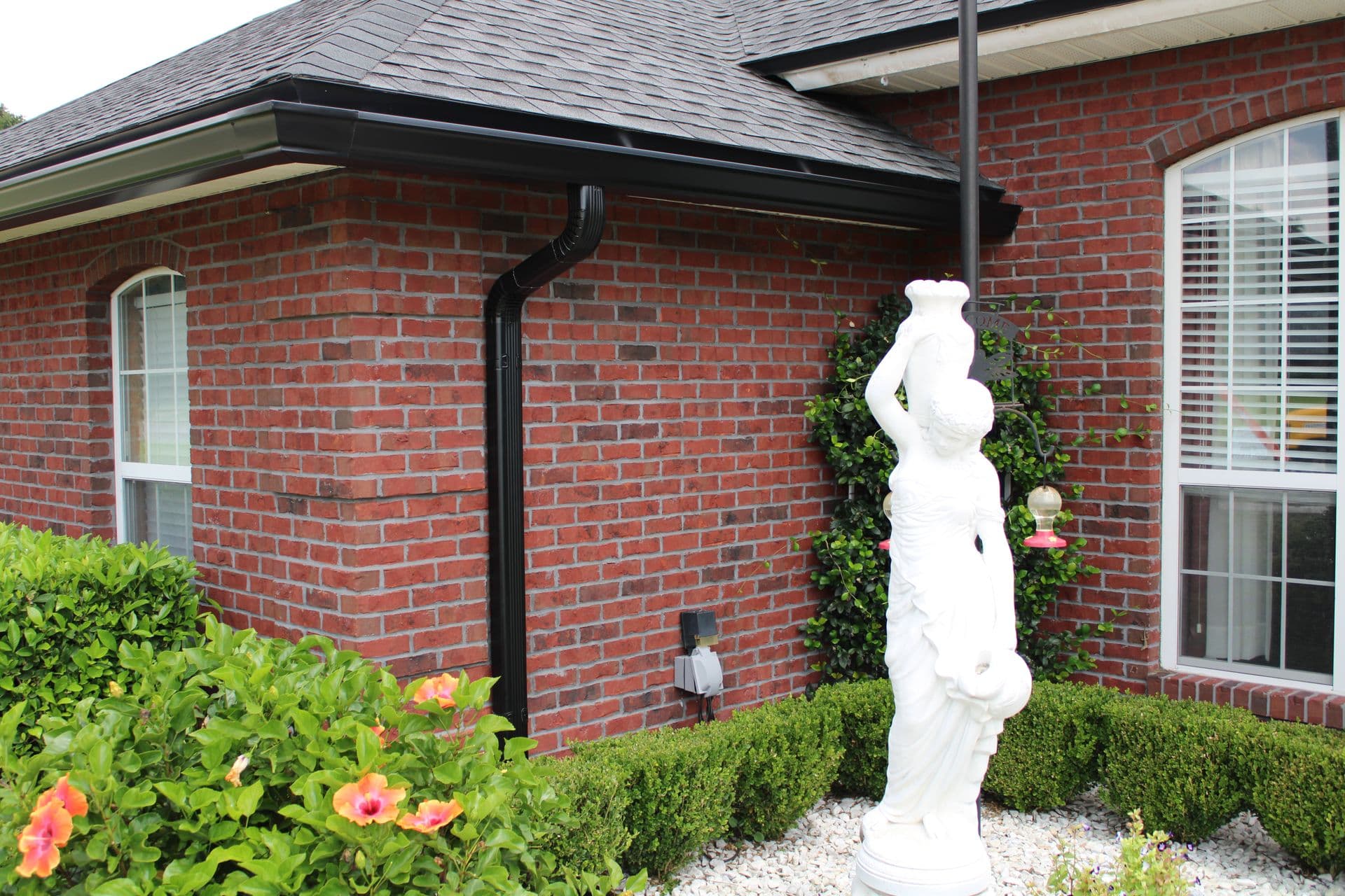 Black Gutters on Home