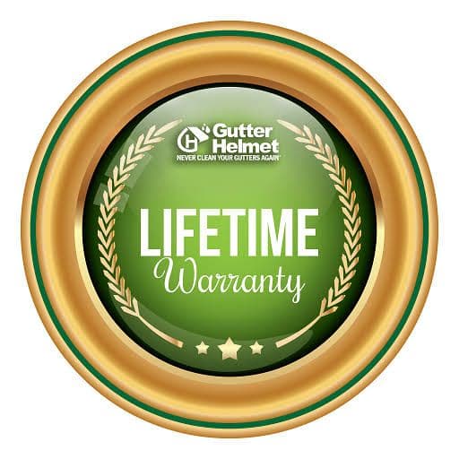 Gutter Helmet lifetime warranty badge with gold ring and green center displaying three stars