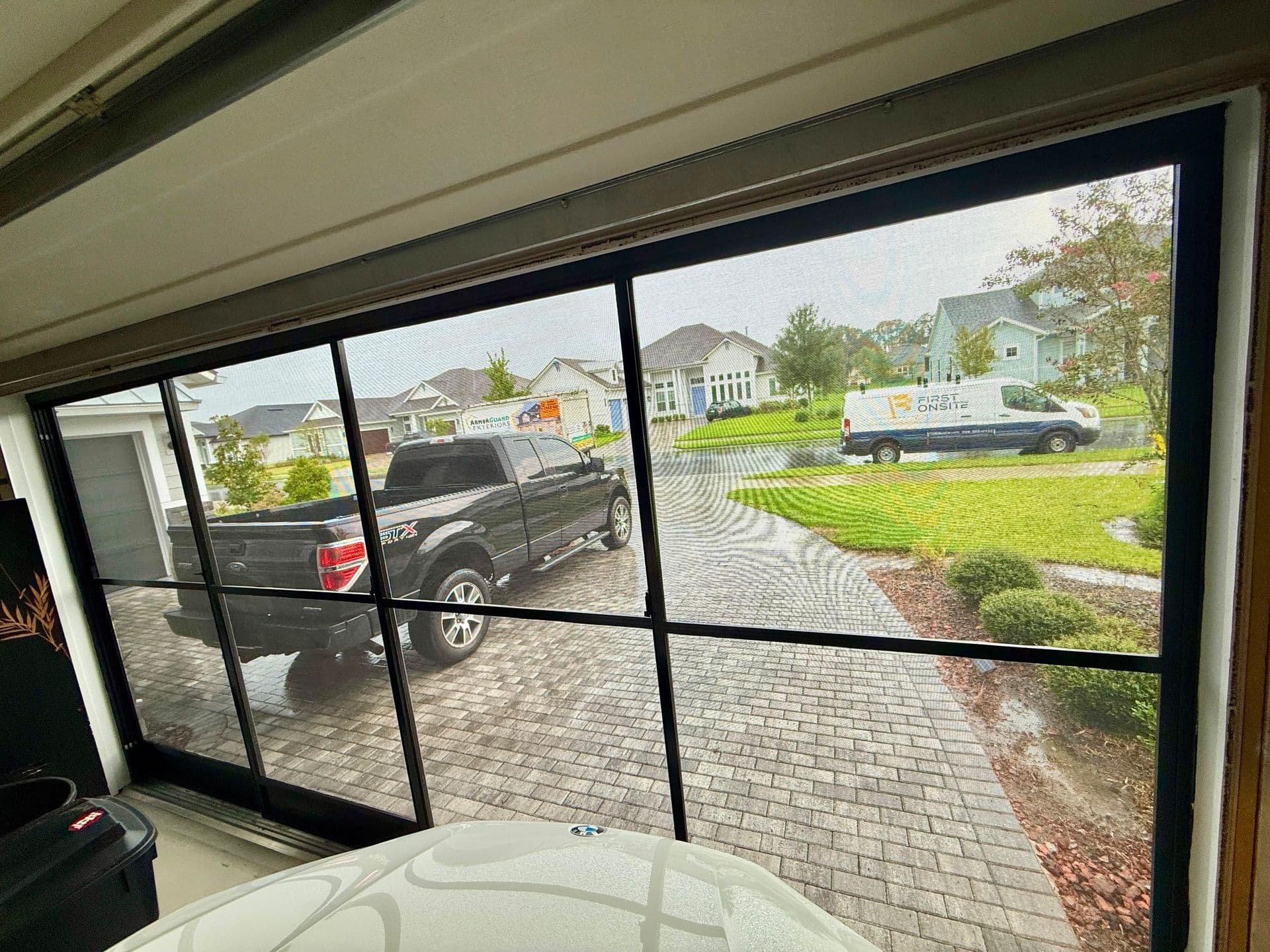 armorbreeze garage screen with truck in the driveway